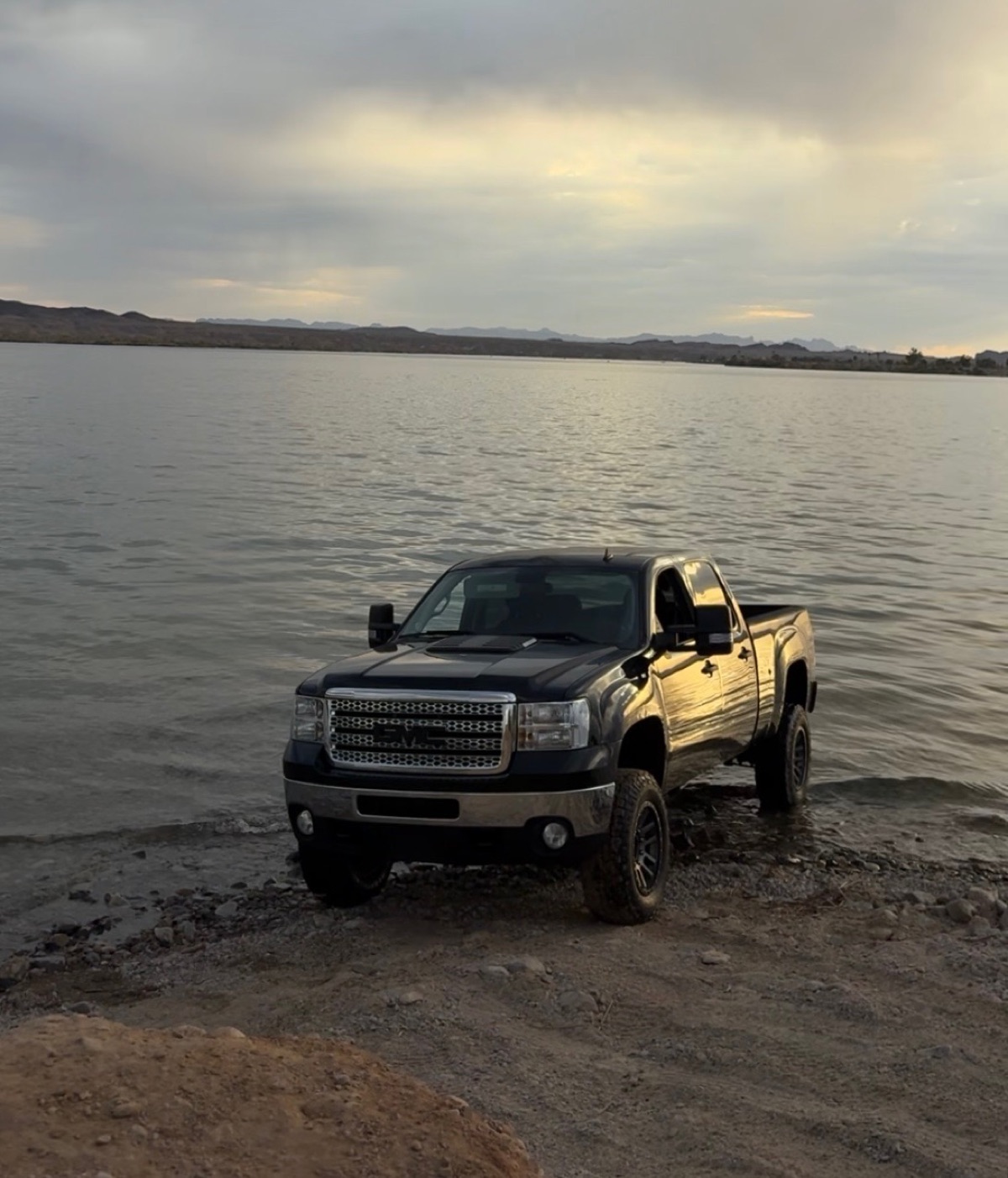 Black GM Duramax diesel truck by Lake Havasu